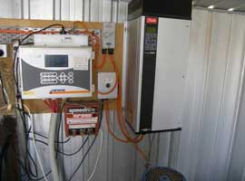 Figure 18. (a) Automatic unit in the shed to operate SDI