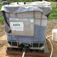 Figure 12. (a) Fertiliser tank